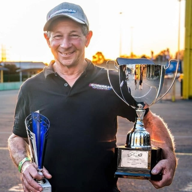 Sciberras MotorSport Pink Polo in honour of Brian Sciberras